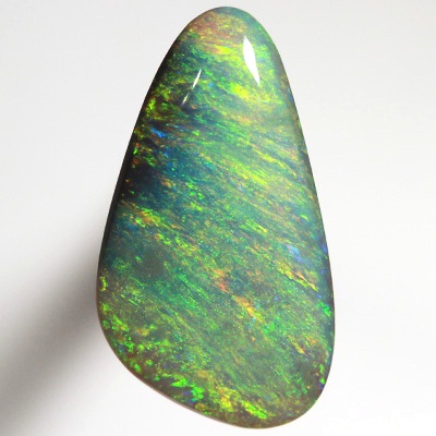 SOLID SEMI BLACK OPAL Bright sparkles of orange and green in an Iris pattern